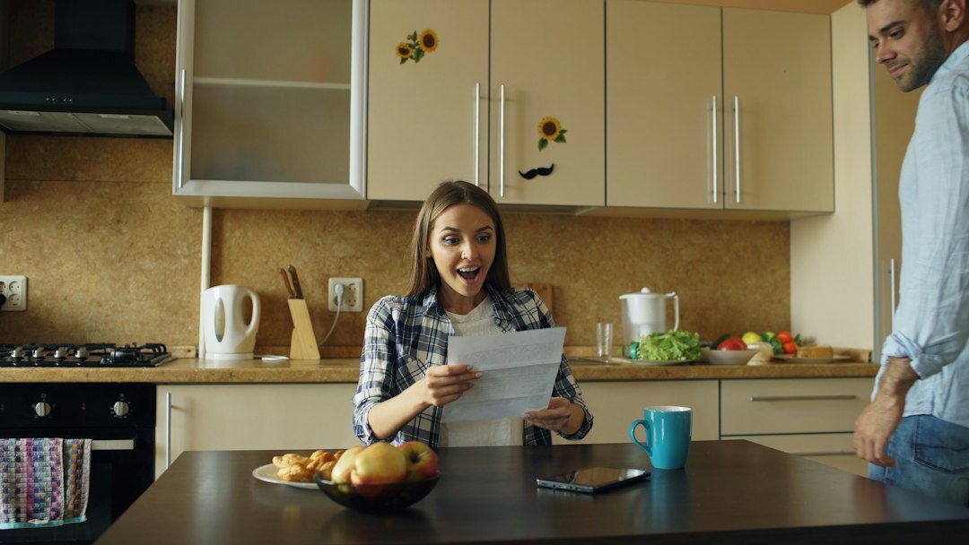 woman reviewing documents at home